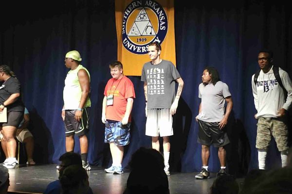 pathfinders on stage receiving awards at southern Arkansas university